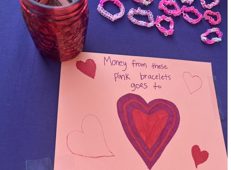 Pink and white loom band bracelets